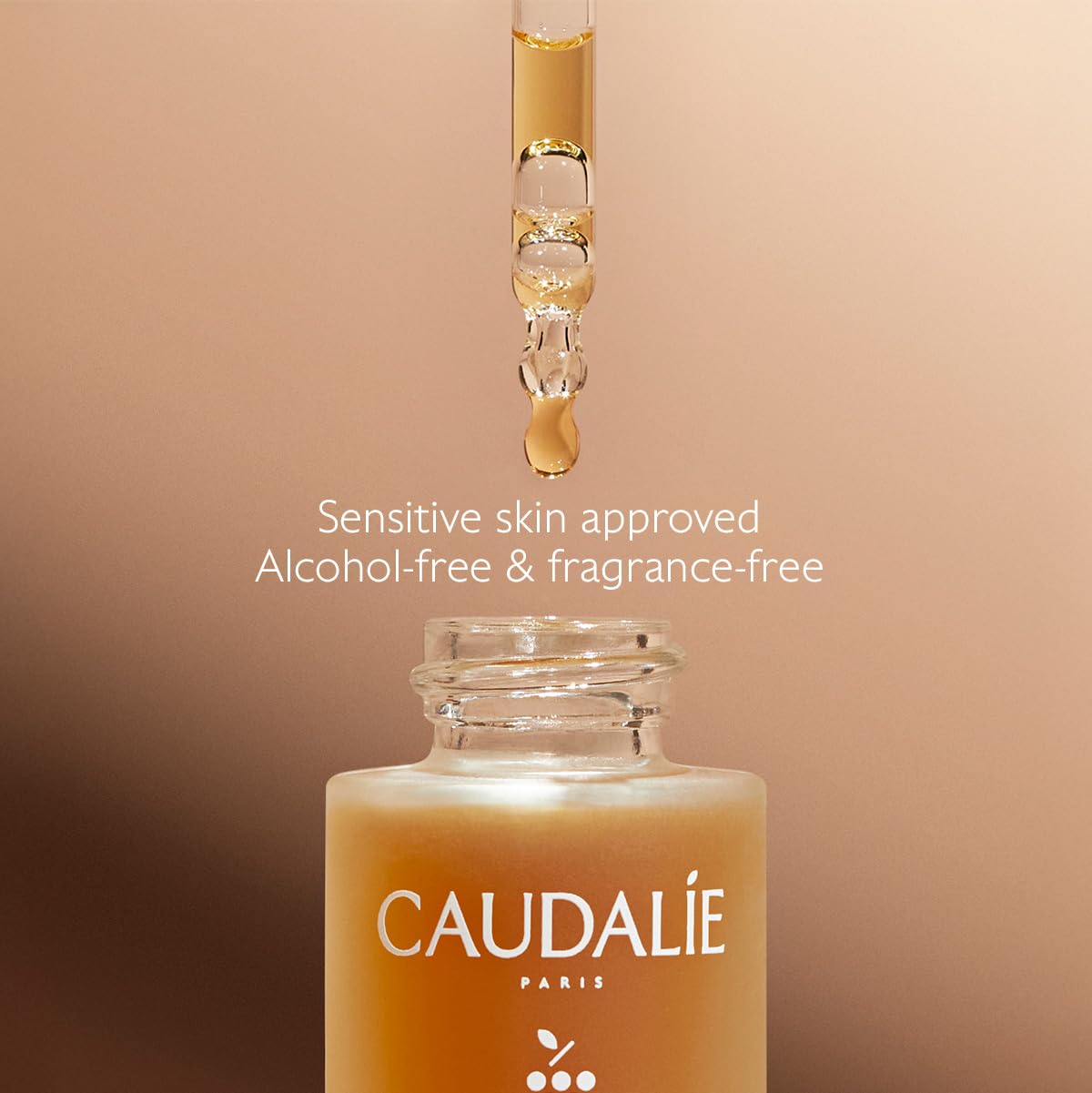 Caudalie 15 mL bottle in hand for scale, compact travel-friendly size advantage