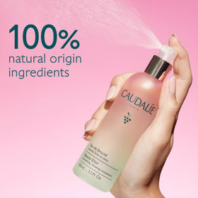 Caudalie spritz on skin demonstrating instant refresh and visible radiance boost