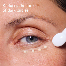 Caudalie ceramic applicator close-up demonstrating cooling massage to reduce puffiness