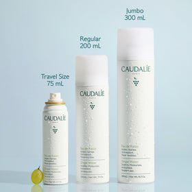 Caudalie bottle in a travel bag to show portable 200 mL size advantage