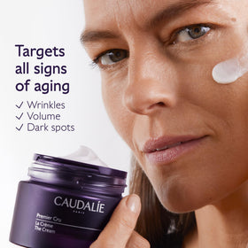 Caudalie refill pod placed inside reusable jar demonstrating eco benefit