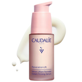 Caudalie bottle front view showing elegant packaging and firming benefits