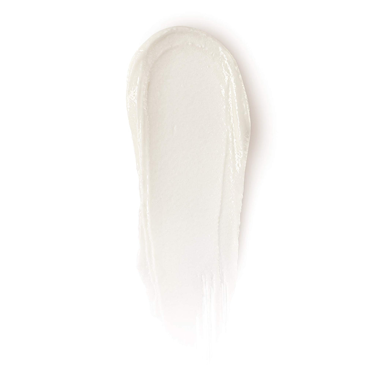 Caudalie close-up texture with volcanic sand beads highlighting gentle exfoliation benefit
