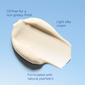 Caudalie cream being applied on cheek showing smoothing and priming benefit