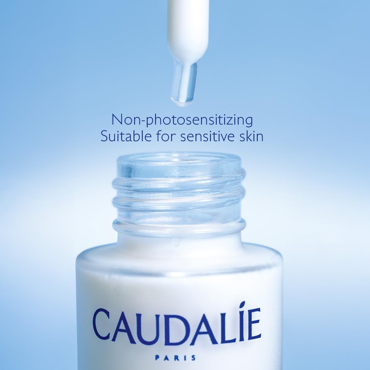 Caudalie bottle on a vanity with towel and plant showing daily routine benefit lifestyle appeal