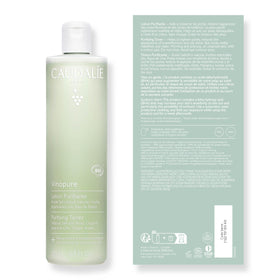 Caudalie Vinopure on bathroom vanity conveying daily skincare routine benefit