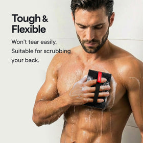CAVEEM scrubber in shower being used to remove dead skin during bathing