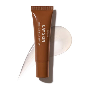 Cay Skin front packaging showing clear high-shine lip balm benefit