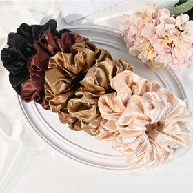 CEELGON scrunchie worn on wrist as accessory adding elegant satin accent
