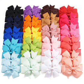 CÉLLOT front packaging showing 40-piece bow set for coordinated outfits