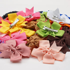 CÉLLOT bow clipped in child ponytail showcasing everyday use