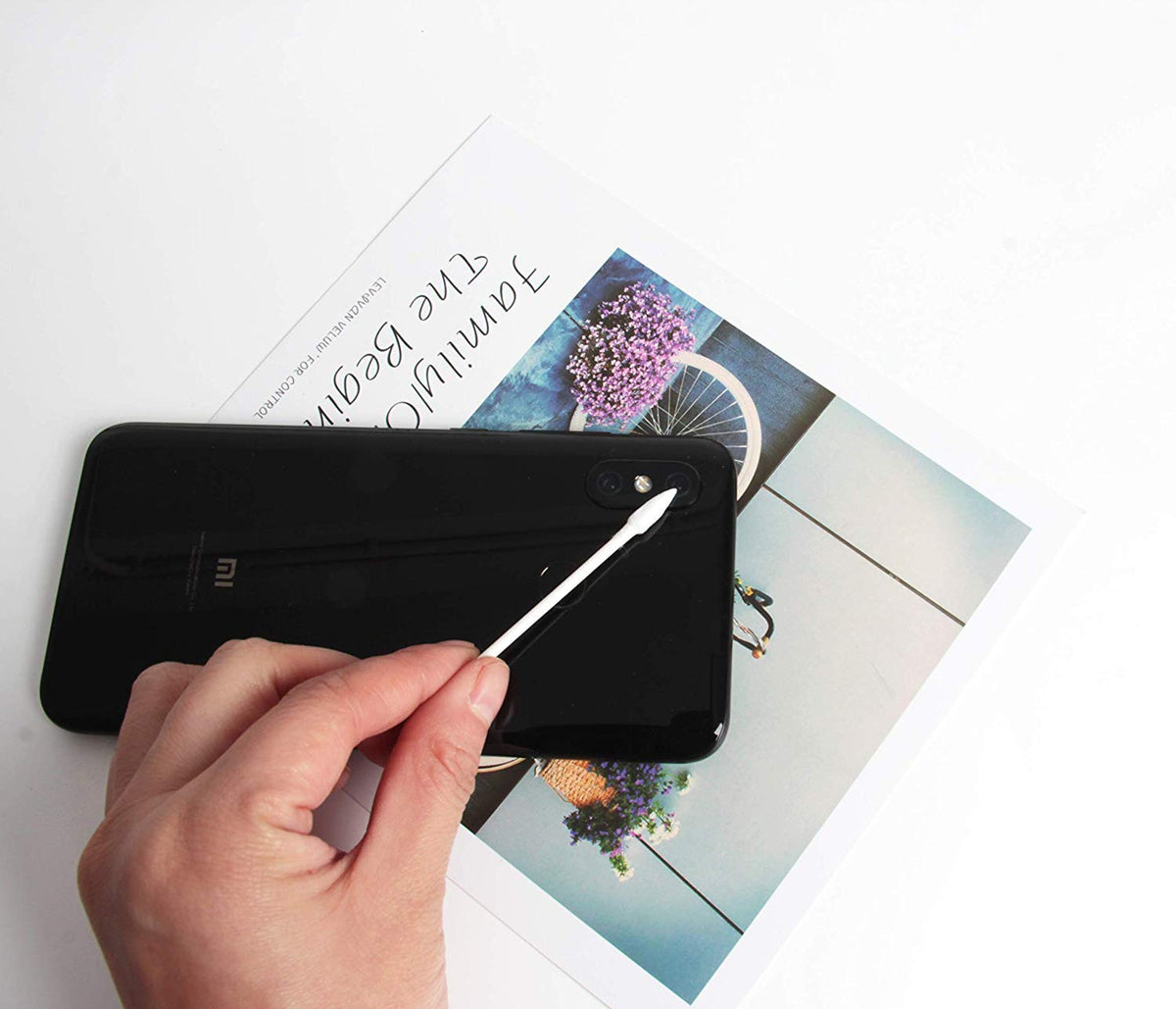 CenYouful swab held in hand to show scale and ergonomic paper stem strength