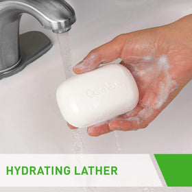 CeraVe hydrating cleanser bar held in hand for size and scale demonstration