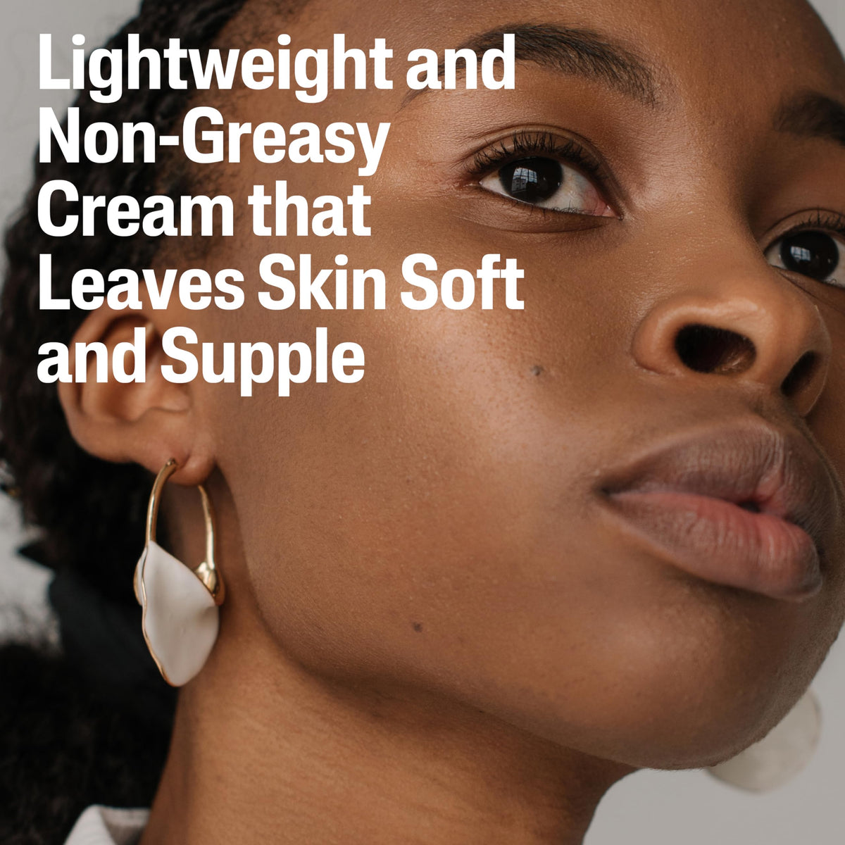 Cetaphil cream spread on cheek illustrating calming skin effect