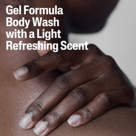 Person using Cetaphil in shower lifestyle shot showing gentle cleansing during daily routine