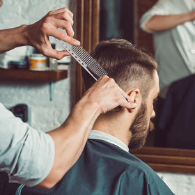 CGBARBER combs laid on salon counter with scissors showing ready-to-use professional setup