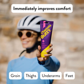 Chamois Butt'r Her' being applied to thigh to prevent chafing and increase comfort