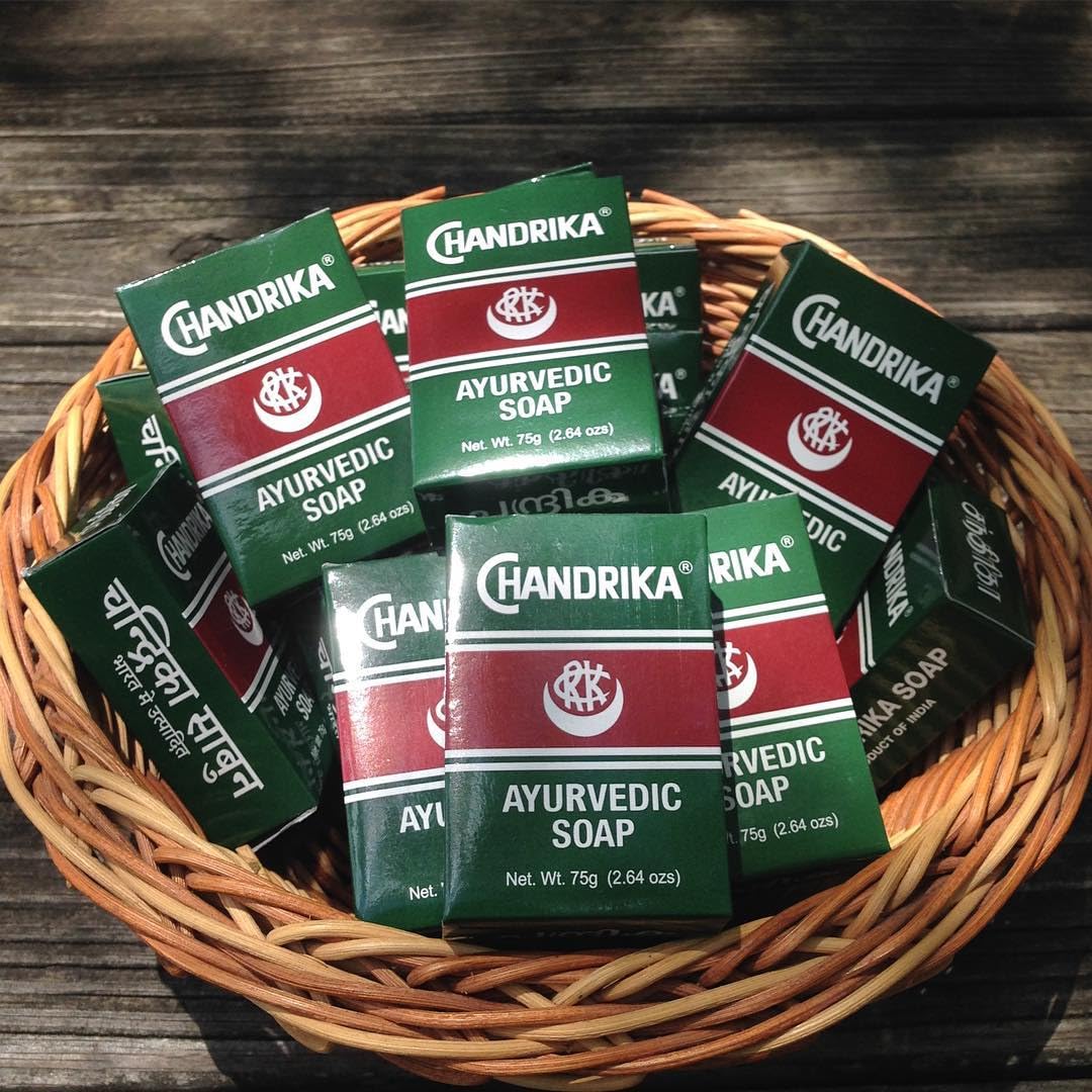 Chandrika soap size comparison with ruler showing 75 g bar compact travel-friendly benefit