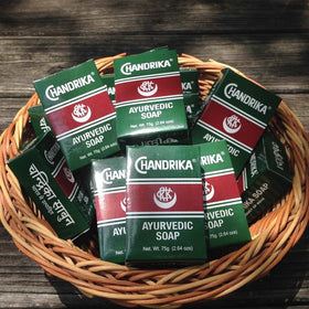 Chandrika soap size comparison with ruler showing 75 g bar compact travel-friendly benefit