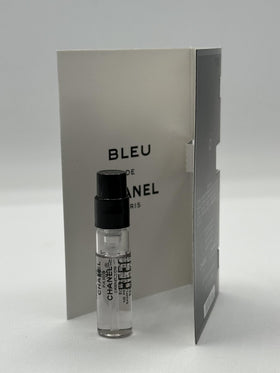 CHANEL sample vial on dressing table conveying Bleu de Chanel elegance for daily wear