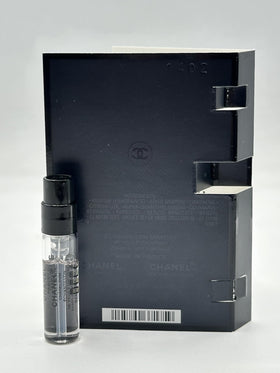 CHANEL vial in hand to show 1.5ml size and travel-friendly convenience