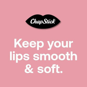 ChapStick beside credit card showing compact 0.15 oz travel-friendly size