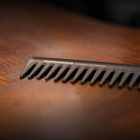 Charlemagne comb detangling wet hair demonstrating gentle knot removal and less tugging