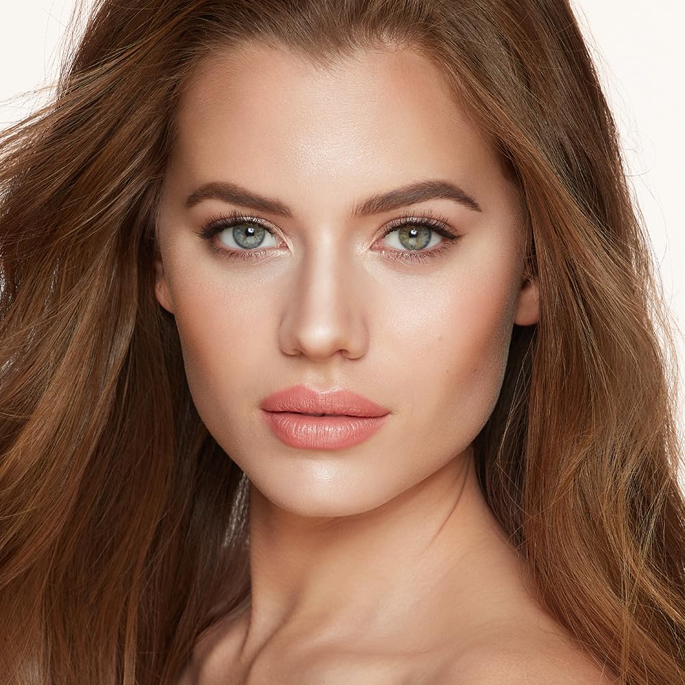 Charlotte Tilbury swatches on skin illustrating buildable bronzer and luminous highlight
