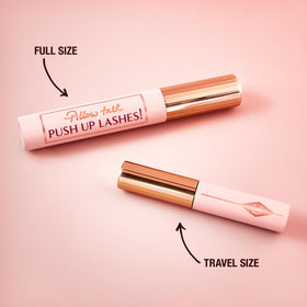Charlotte Tilbury brush held vertically to show precision application benefit