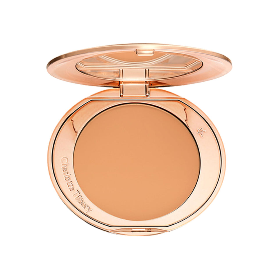 Charlotte Tilbury compact front view showing elegant packaging and instant polish