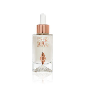 Charlotte Tilbury front packaging of Magic Serum Crystal Elixir showing premium bottle and compact size benefits