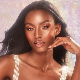 Charlotte Tilbury heart-shaped applicator close-up for precise, cushioned application