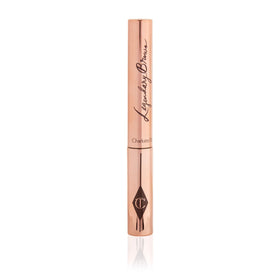 Charlotte Tilbury application on model showing lifted, feathered brows for polished look