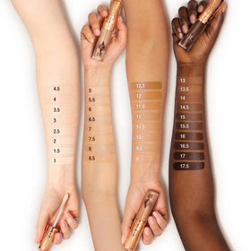Charlotte Tilbury lifestyle image in a makeup bag near mirror benefit: ready-for-touchups