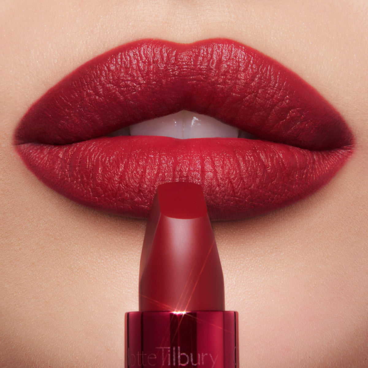 Charlotte Tilbury lipstick applied on lips demonstrating smooth, defined finish