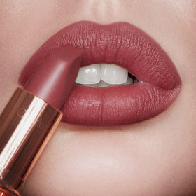 Charlotte Tilbury open packaging with lipstick visible highlighting giftable presentation benefit