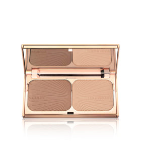 Charlotte Tilbury palette held in hand to show size and travel-friendly convenience
