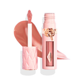 Charlotte Tilbury product front packaging showing glossy plumping finish and benefit