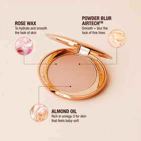Charlotte Tilbury powder with rose wax and almond oil highlighting skin nourishment
