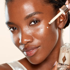 Charlotte Tilbury visual of key actives like peptides and vitamin C emphasizing targeted efficacy
