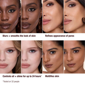 Charlotte Tilbury mist bottle held in hand to show size and easy application