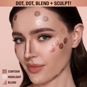 Charlotte Tilbury swatch on skin displaying buildable rose-gold radiance
