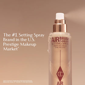Charlotte Tilbury being sprayed on model to show long-wear finish benefit
