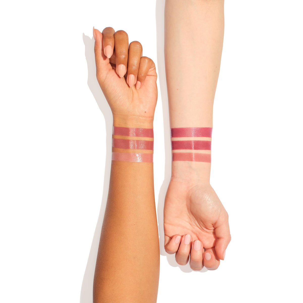 Charlotte Tilbury styled on vanity with cosmetics, inspires polished everyday glamour