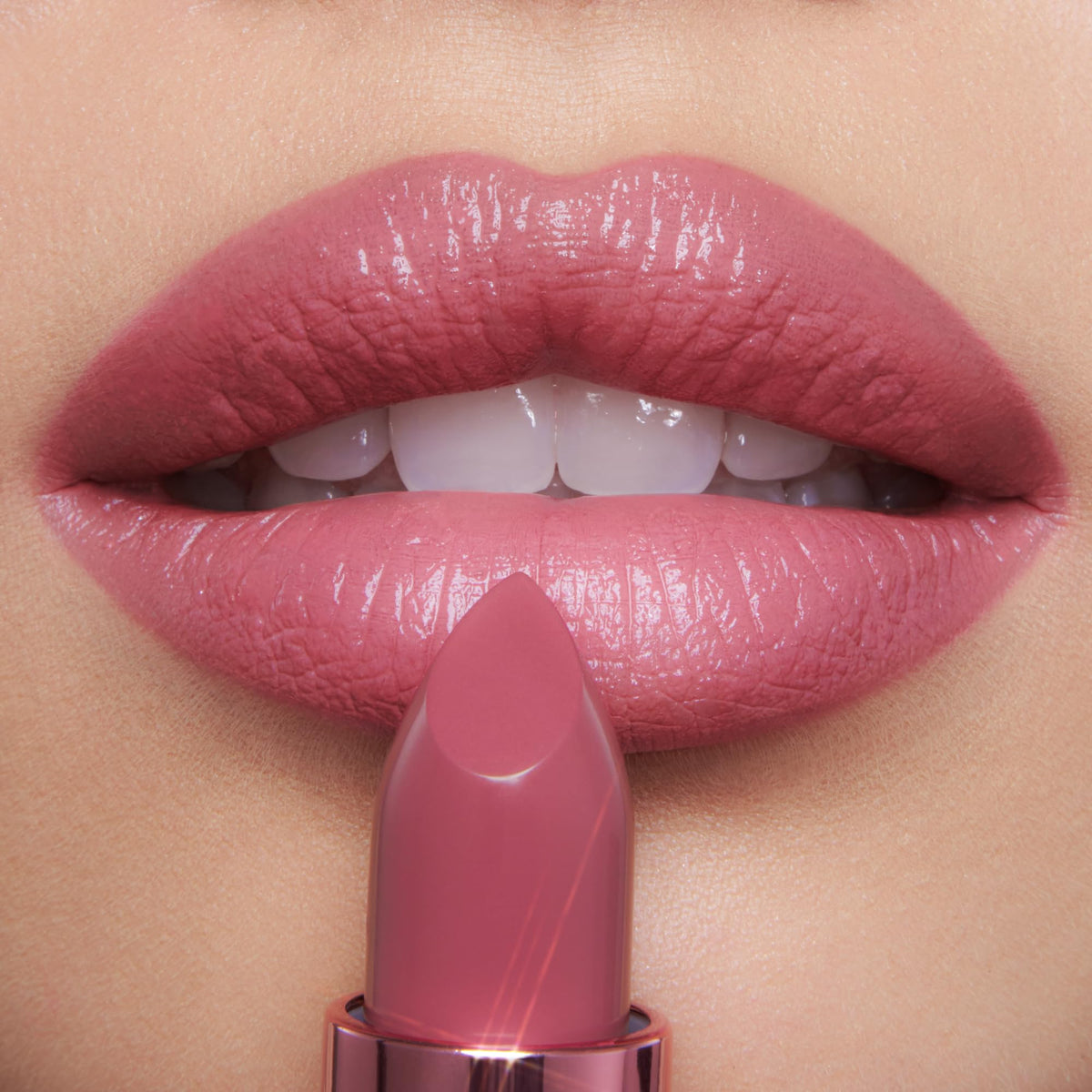 Charlotte Tilbury texture close-up showing glossy and matte finishes, visible hydration