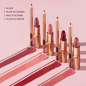 Charlotte Tilbury lipstick next to liner pencil showing size and application tool benefit