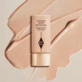 Charlotte Tilbury Wonderglow open cap with creamy texture demonstrating silky spreadability