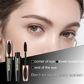 Charm Kiss open tube revealing creamy formula for smooth, clump-free coating