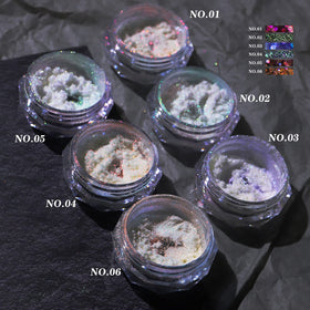 CHARMING MAY jars held by fingers showing product scale and portable convenience