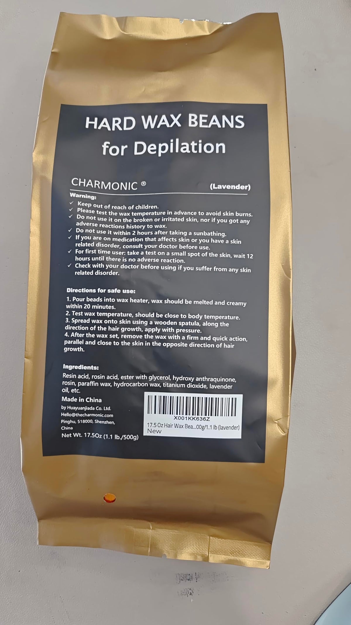 Charmonic 500g wax beside common items for clear size and quantity reference